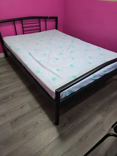 A private furnished bedroom on main floor with sharing bathroom with one person in a bungalow home i...