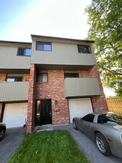 Brick 4 + 1 bedroom end-unit fully furnished townhouse nestled in quiet enclave available for rent s...