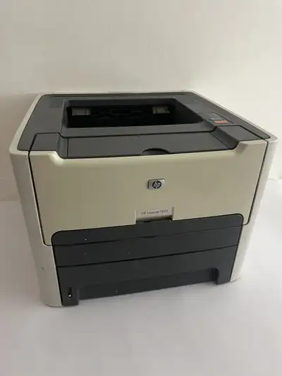 The HP LaserJet 1320 is a Laser printer that uses toner ( not ink ) to print ONLY in Black + White....