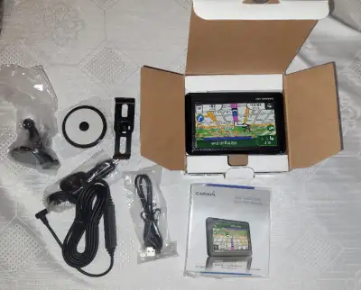 New Garmin Nüvi 1490T GPS/ Maycom  AR 108 air band scanner, View more