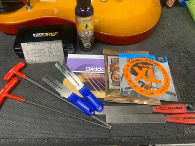 Guitar Setup, repairs, re-strings, View more