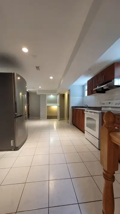 Renovated space, shared bathroom, kitchen, living room and laundry room. Walkout basement.