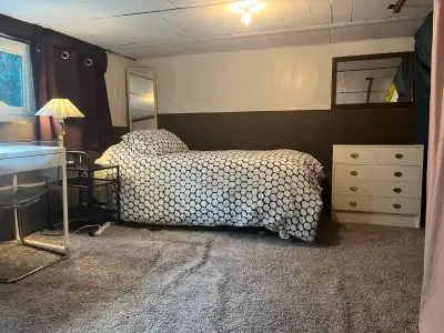 Clean, cozy, furnished bedroom in a quiet full equipped and furnished basement suite in Dunbar. Avai...