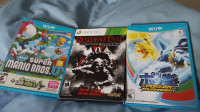 XBOX 360 Resident Evil Racoon and Super Mario Bros U & Lugia U