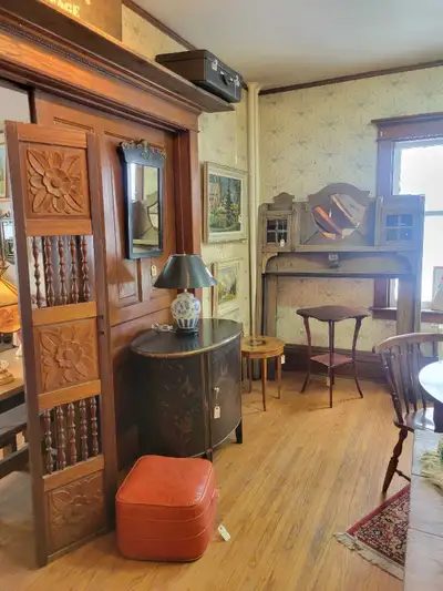 This is an antique oak wood fireplace mantel, perfect for adding a touch of vintage charm to your ho...