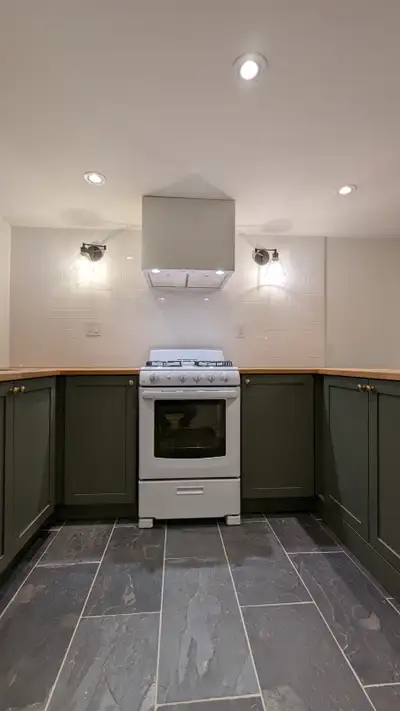 Two-bedroom, one bathroom basement apartment approximately 700 sq ft (65sq m) in a well-kept multi-u...