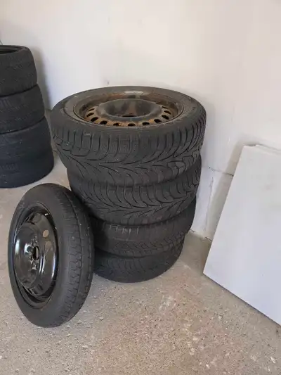 For sale is a package including four steel rims mounted with winter tires and one separate compact s...