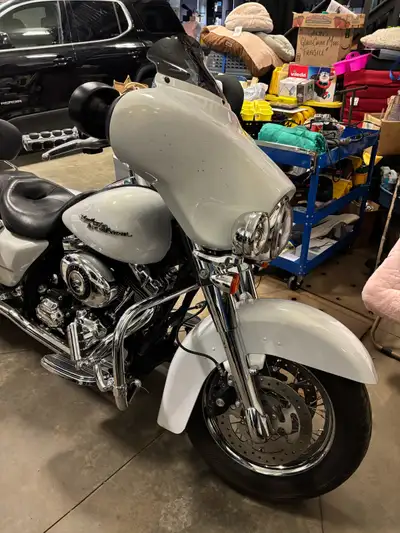 I am selling my dads bike for him. It is a 2008 Harley Davidson FLHX 208 street glide. It has a stag...