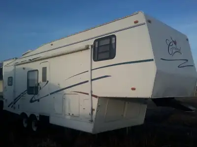 1 slide, good tires, can deliver $3500 ph. 306 960-5074-all work--