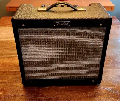 Original version blues junior. 15 watts of warm tube tone. Upgraded speaker to Celestion Vintage 30....