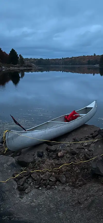 14ft Aluminum canoe made by Lowe line. Older but in great shape with no leaks. Small crease on side...