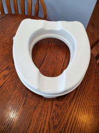 Toilet  seat to raise up higher