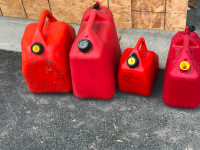 Gas cans and a tank gas dispenser