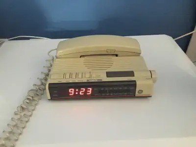 Alarm clock with telephone , View more