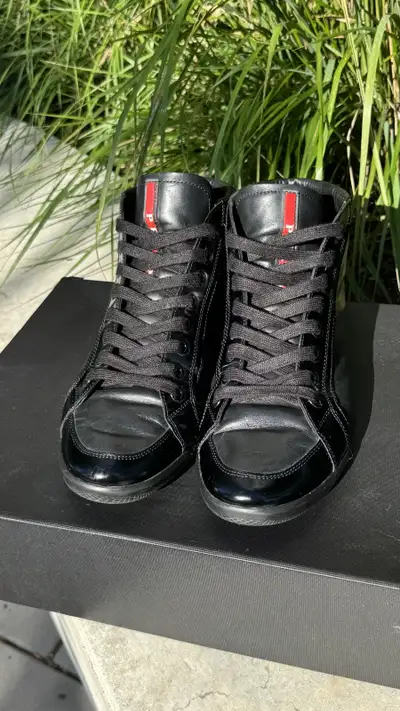 PRADA Black Leather High Top Sneakers Men, View more