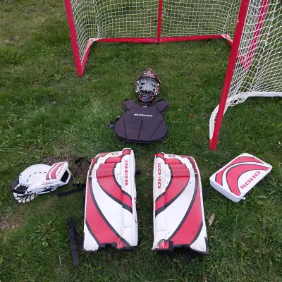 2 Like new hockey nets and gear., View more