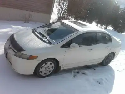 5 speed standard. This car has been reliable and never has let me down . It was driven daily from Re...