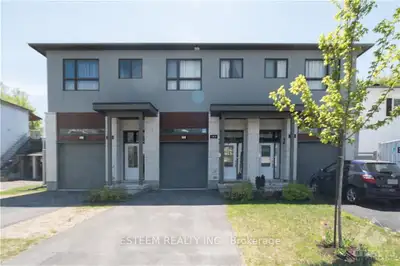 Breathtaking south facing contemporary townhome constructed in 2019. Open Concept 3 bedrm (1bedrm is...