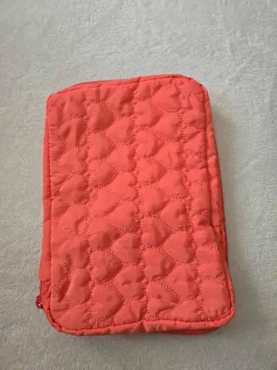 Toiletries/makeup travel bag/organizer. Zippers are working smoothly. No rips or stains in excellent...