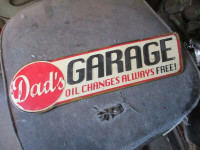 DAD'S GARAGE TIN WALL SIGN $30. OIL CHANGES ALWAYS FREE