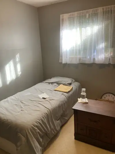Furnished bedroom for rent on a shared main floor with landlord. House is a bi-level split in quiet...