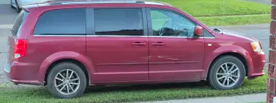 For sale - 2014 Dodge Grand Caravan SE - Red exterior, Black Interior AS IS. Just over 200,000 miles...