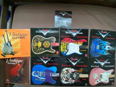nine guitar calendars looking for a home, View more