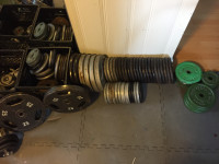 Workout weights - 50lb ($60 each) and 25lb ($30 each) plates.