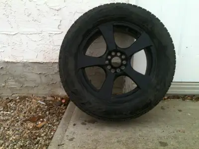 Set of 4 tires and mag rims. Size 245-60R-18 The rims are universal rims that should fit most light...