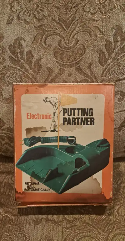 Vintage electronic putting partner, View more