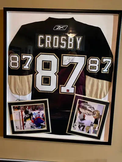 Authentic Jersey with pictures inserted , professionally boxed . Non smoking home