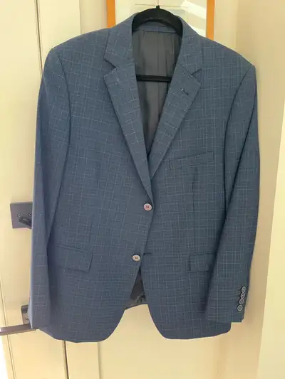 Perfect for Grad! Like new suit jacket, in a checked blue plaid. Size is 42 Short. Pick up in Dalhou...