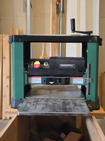 13” thickness planer, helical cutter head, will need some new knives.