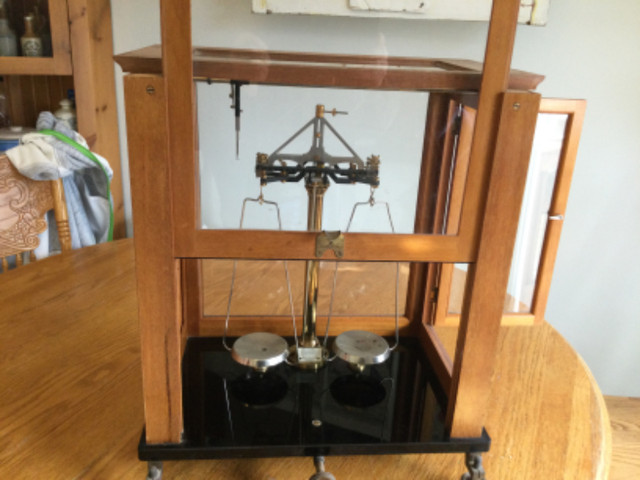 Antique balance scale in glass and wooden case in Arts & Collectibles in Kingston