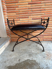 Cushioned seat on this Vintage Cast Iron Indoor Bench, $75