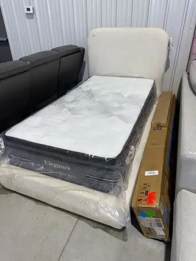 Twin sized bedframe with firm mattress , View more