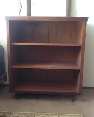 Mid Century Modern teak bookcase. This dates back to the late 60's - early 70's and in good conditio...