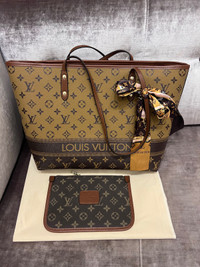 Louis Vuitton tote handbag with twilly ($250)