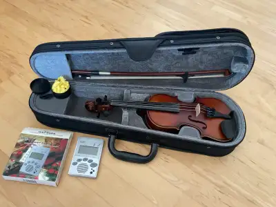 Starter violin for 3-5 yr old. Case, rosin and tuner included. Pick up in Woodlands SW Calgary -See...
