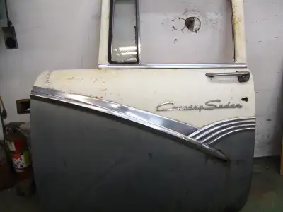 Drivers door has a solid door box with some rust damage on the lip plus a hole behind the stainless...