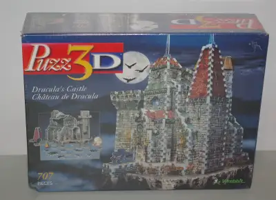 Right in time for Halloween. New in the box, still wrapped 3D jigsaw puzzle of Dracula's Castle. The...