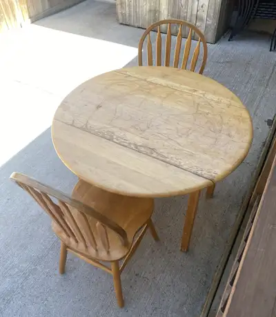 Oak dining table 42" with folding parts n 2 chairs can deliver, View more