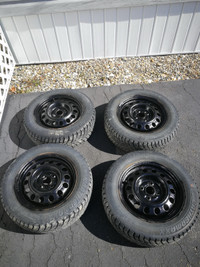 4 winter tires on rims 14”