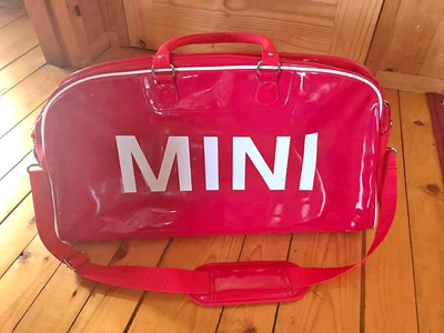 Lipstick red official MINI bag. Official Mini duffle bag. Very Distinctive. Red with shoulder strap....