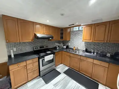 This charming, gently lived-in rental unit offers a functional layout perfect for comfortable living...