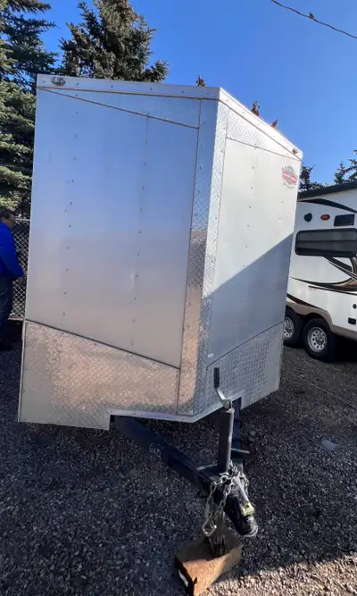 6 x 12 cargo enclosed trailer with barn doors up to 3000 pounds Dry weight 1150lb 2 inch bowl 50$ a...