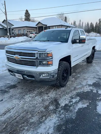 Rust free 2015 Chevy Silverado, LTZ fully loaded with leather heated seats, integrated trailer, brak...