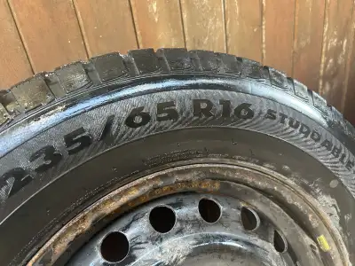 235/16 R16 snow tires mounted on rims. Total of 4 Fits 2010 and earlier Dodge Grand Caravan Vehicle...