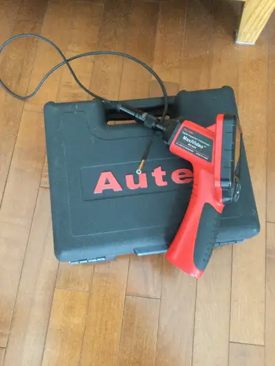 Comes with case, the unit, the scope & the charger Pickup is in Charleswood area