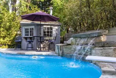 Outdoor patio:Hanamint high table, 4 swivel chairs and umbrella, View more